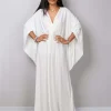 white-kaftan-beach